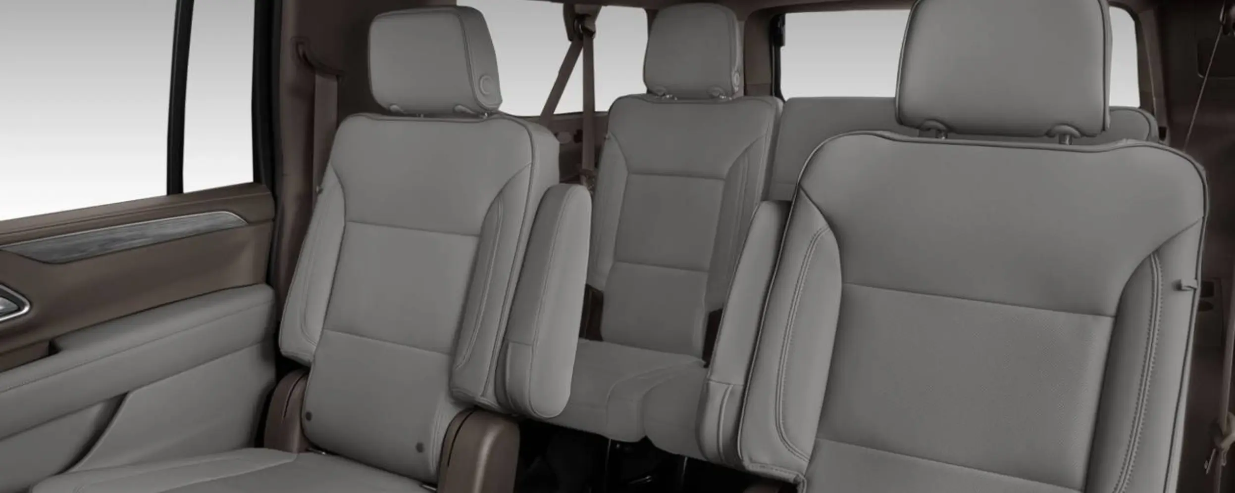 6-seater-black-gmc-yukon-xl-denali-2024-passenger-seats.webp